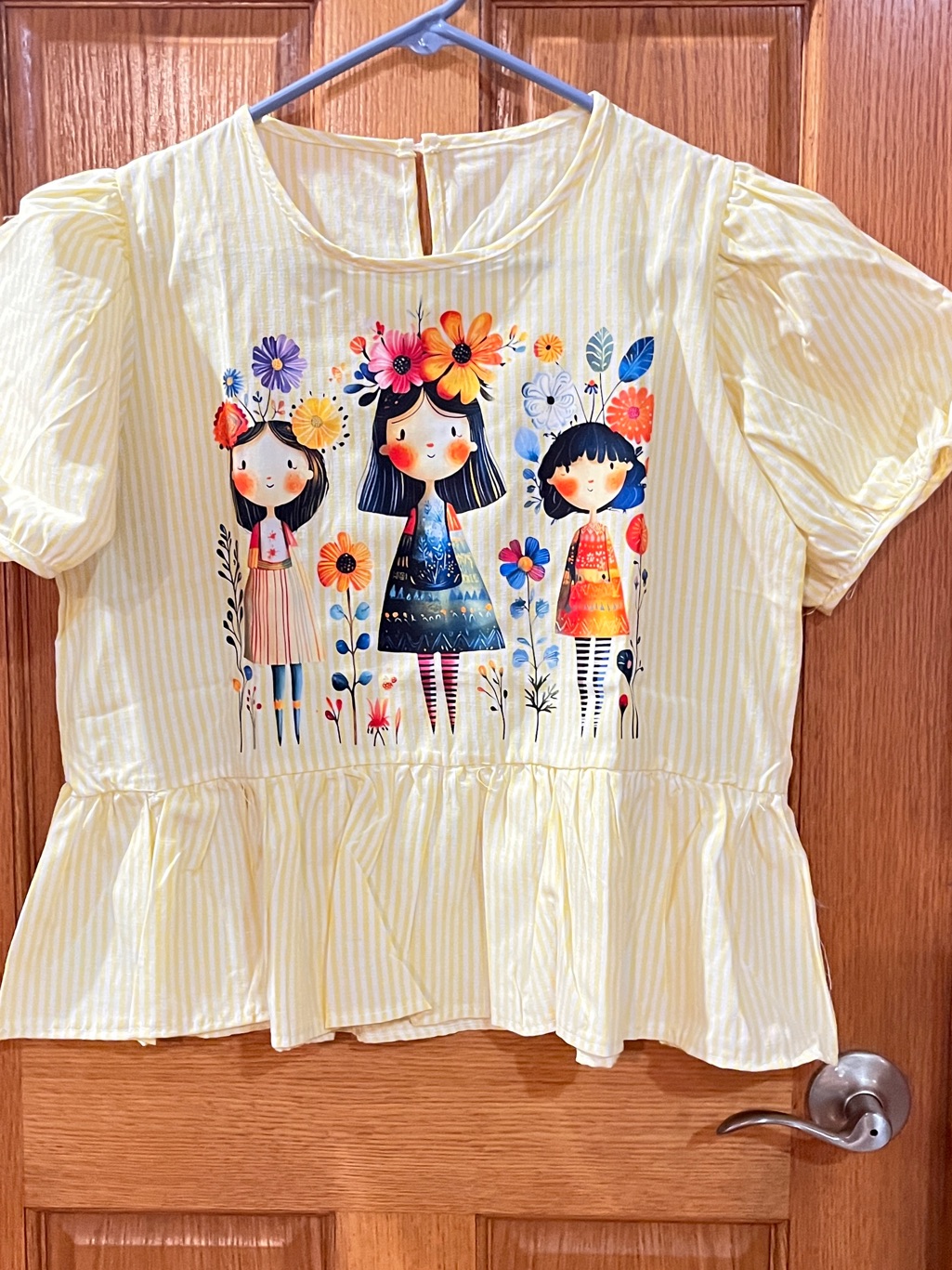 Lady’s Yellow Floral Graphic Peplum Top